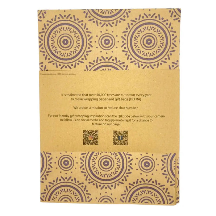 Brown recycled kraft paper gift wrap with purple circular mandala patterns folded in a 1m by 50cm sheet