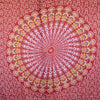 Pink rose mandala sarong with vibrant red fabric and intricate yellow white and purple concentric patterns