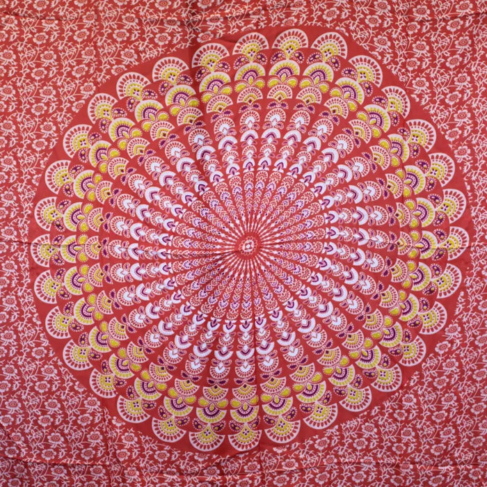 Pink rose mandala sarong with vibrant red fabric and intricate yellow white and purple concentric patterns