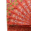 Mandala sarong in vibrant orange fabric with white green and purple fan motifs featuring pink rose accents
