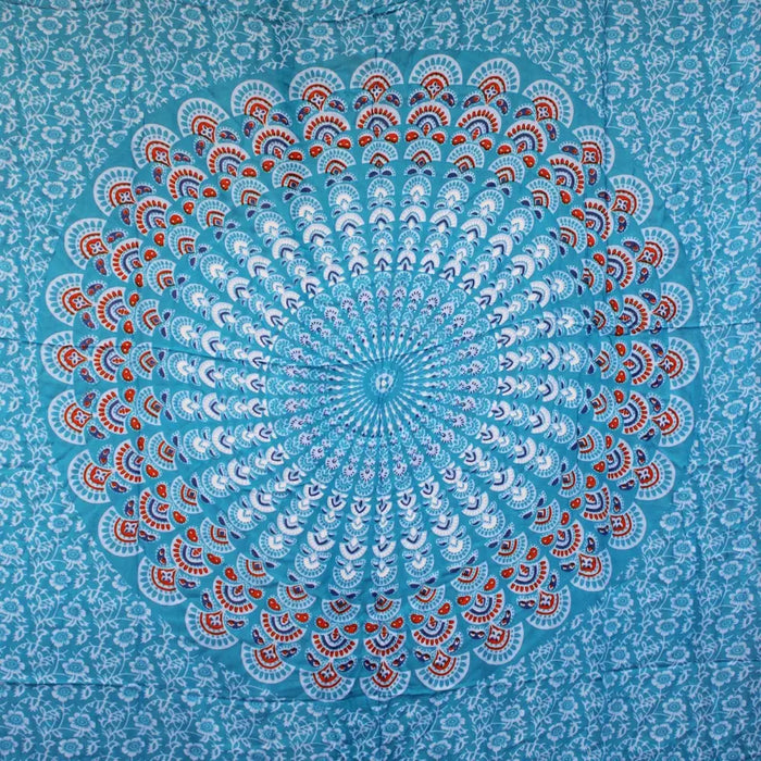 A teal orange mandala sarong with vibrant turquoise fabric featuring intricate red white and blue paisley patterns