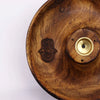 Hand carved mango wood incense burner disc with brass holder and engraved hamsa symbol for sticks and cones