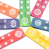 Set of seven assorted colours wooden incense sticks with white chakra symbols in mango wood ashcatcher design