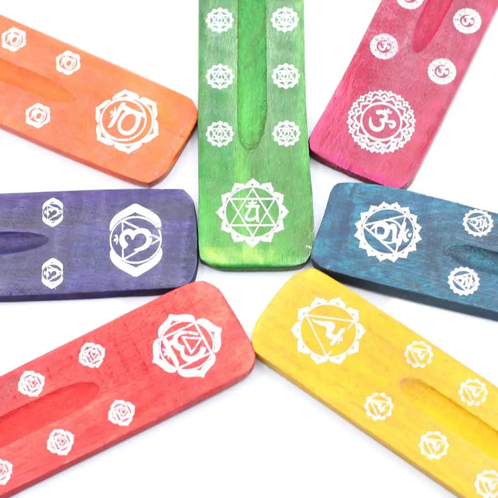 Set of seven assorted colours wooden incense sticks with white chakra symbols in mango wood ashcatcher design