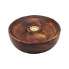A round dark brown mango wood incense burner with a smooth finish and a brass circular insert for wood incense sticks and cones