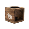 Brown mango wood oil burner cube with inset white elephant design and two black circular compartments