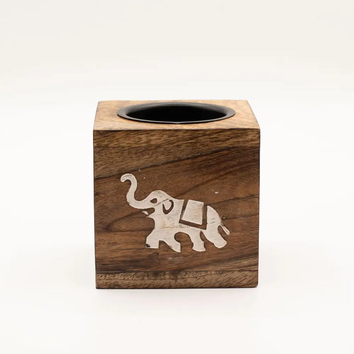 Wooden cube-shaped tissue box with white carved elephant design made from mango wood for wood oil burner use