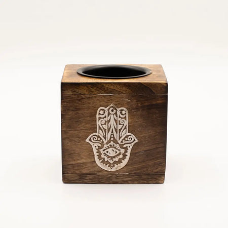 Dark brown mango wood oil burner tissue box with carved lighter wood hamsa hand and black inner compartment