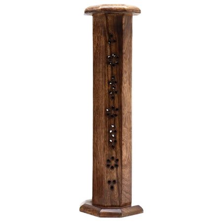 A tall dark brown mango wood smoke tower with octagonal base and floral cutouts along its sides
