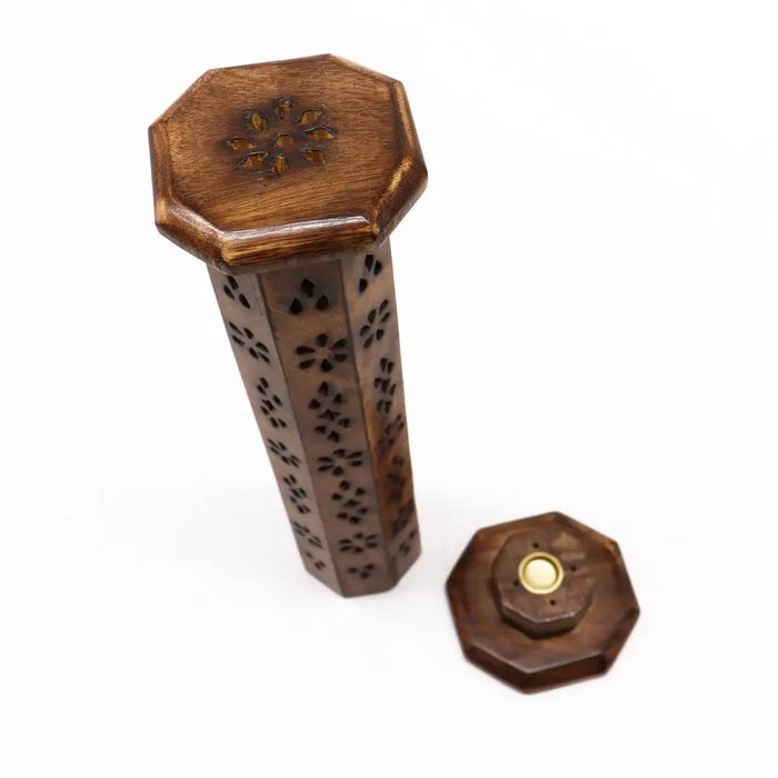 Dark brown mango wood tower incense burner with octagonal shape floral cutout patterns and brass center lid