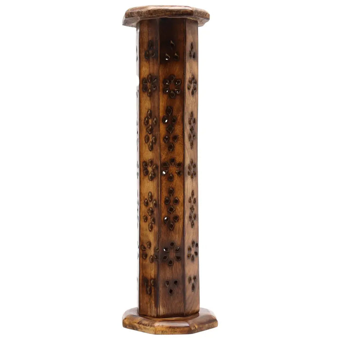 Tall hexagonal mango wood tower incense burner with intricate floral carvings and warm brown finish