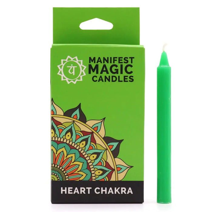 A vibrant green slender wax candle stands next to its branded packaging for manifest magic candles heart chakra green