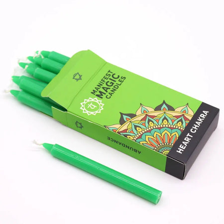 Bright green slender wax manifest magic candles in a lime green box with mandala designs for heart chakra use