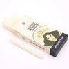 A set of cream ivory wax manifest magic candles in a box with an illustrated guardian angel for protection