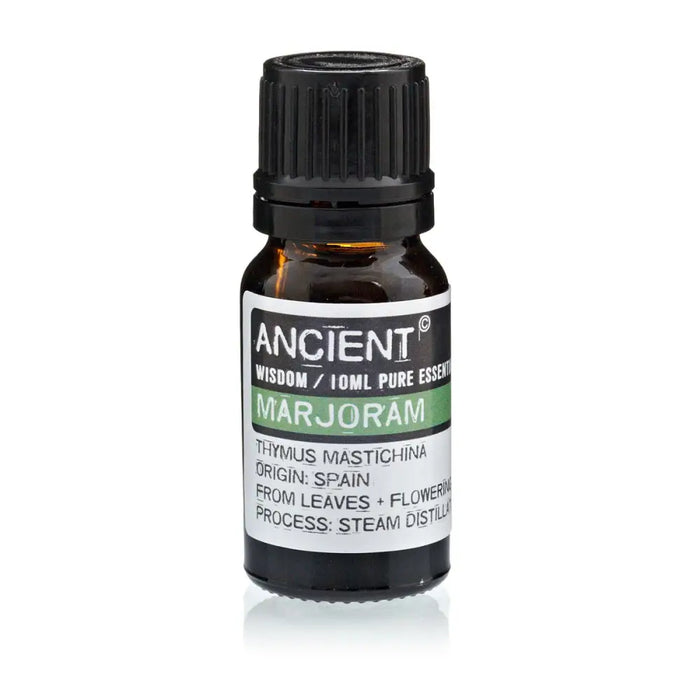 A small amber glass bottle of marjoram essential oil with a black cap and a white label from spain