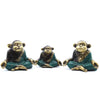 Three brass monkeys seated in meditation wearing teal green robes with gold trimming meditating brass monkeys set of three