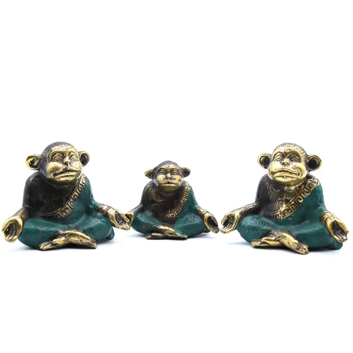 Three brass monkeys seated in meditation wearing teal green robes with gold trimming meditating brass monkeys set of three