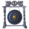 Medium black 35cm gong with dark blue bronze and golden center mounted on a wooden stand with carved dragon motifs