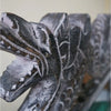 Medium gong on stand with a dark wood dragon head carved and white painted details on scales and teeth