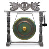 Medium 50cm bronze gong with verdigris patina and golden center on a carved wooden dragon stand with green wash finish