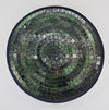 Medium mosaic tile dish with green and silver reflective tiles in concentric circles and a dark border