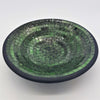 Medium mosaic tile dish with green and black glass tile rings and a dark rim in a circular bowl shape