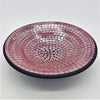 Medium mosaic tile dish with pink and silver gradient tiles in concentric circles and a black rim