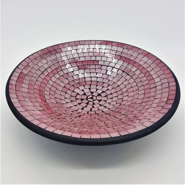 Medium mosaic tile dish with pink and silver gradient tiles in concentric circles and a black rim