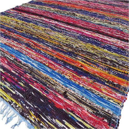 Medium rag rug with bold horizontal stripes in reds blues yellows and purples made from woven fabric rag rugs