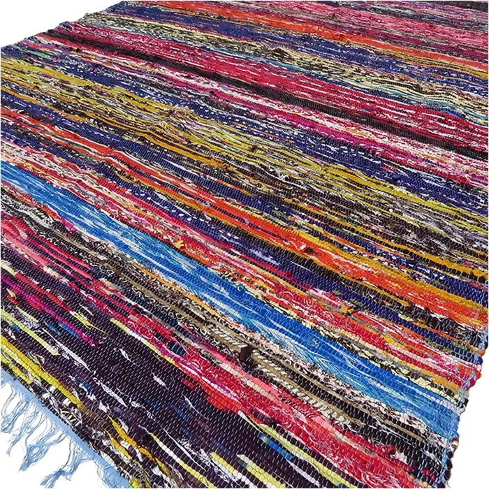 Medium rag rug with bold horizontal stripes in reds blues yellows and purples made from woven fabric rag rugs
