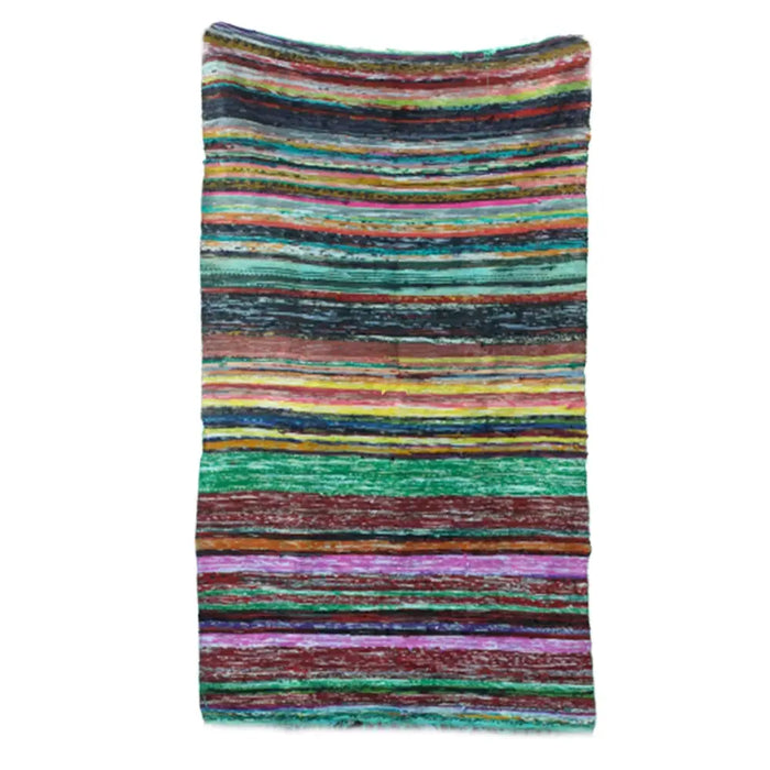Medium rag rug in green with bold horizontal stripes in teal red yellow purple made from handwoven rag rugs material