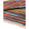 Medium rag rug with vibrant multicolored woven cotton stripes and fringed edges natural rag rugs style