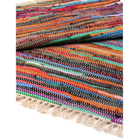 Medium rag rug with vibrant multicolored woven cotton stripes and fringed edges natural rag rugs style