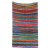 Medium rag rug with bold multicolor horizontal stripes in red blue green orange and purple handwoven from natural fibers