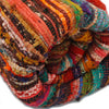 Medium rag rug orange made from vibrant multicolored fabric strips woven into a handcrafted patchwork rag rug design