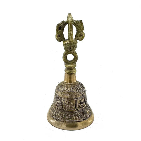 Medium tibetan tingsha bell made of brass with intricate engravings and a decorative handle featuring a wheel motif