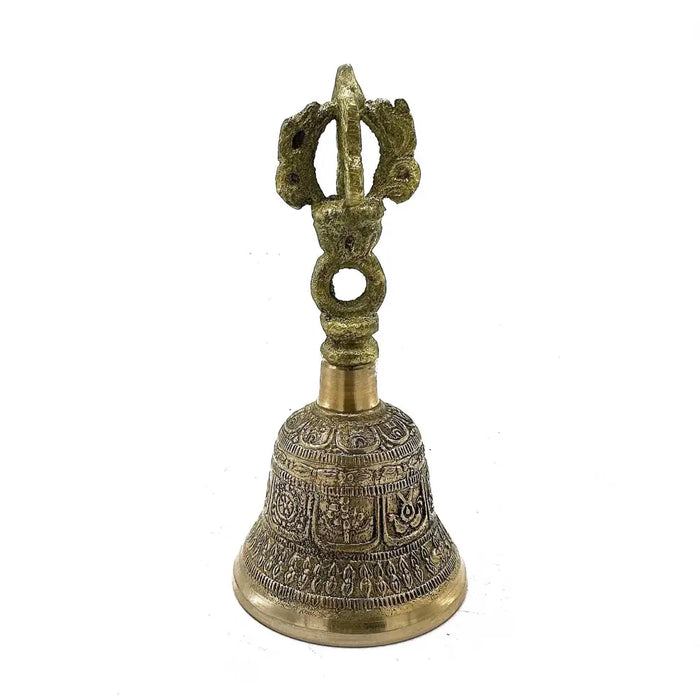 Medium tibetan tingsha bell made of brass with intricate engravings and a decorative handle featuring a wheel motif