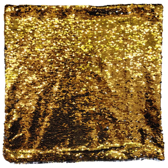 A square mermaid cushion cover with shimmering gold and silver sequins and reversible black fabric for a standard cushion