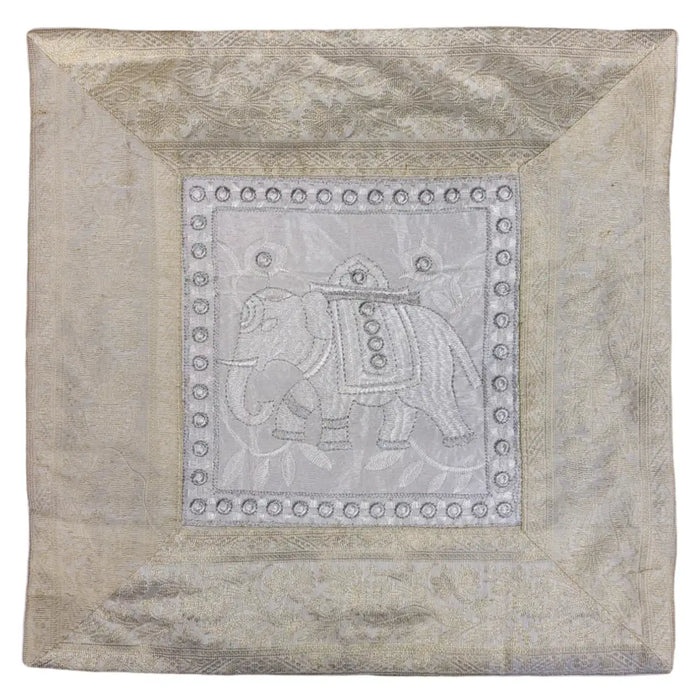 Silver embroidered elephant cushion cover with intricate beadwork and metallic thread on a standard cushion