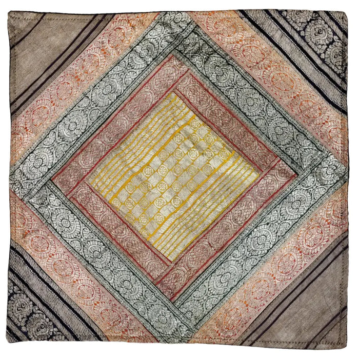 A square silk patchwork cushion cover with metallic thread in gold silver red and earth tones for standard cushions