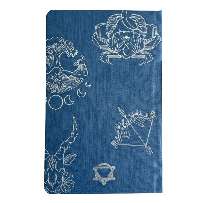 Midnight blue wellness journal with blue hardcover and white zodiac and celestial line art on 120 pages