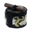 Black and gold patterned fabric case holding a dark wood mallet for a mini singing bowl gift set black