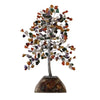 Mixed stone gemstone tree with silver metal trunk and multicolored crystal stones on an organite triangular base