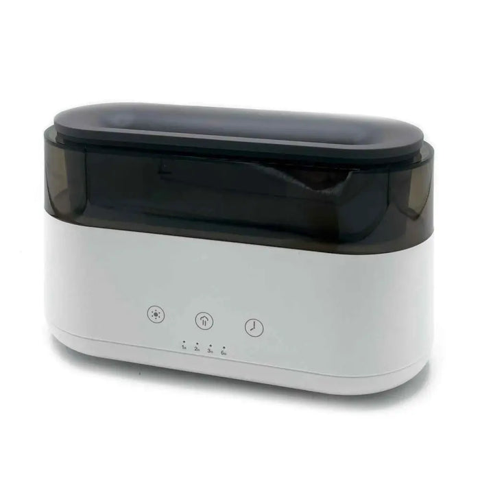 White and black ultrasonic cleaner with three buttons shown alongside a modern aroma diffuser with led clock and flame effect