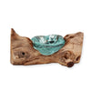 A turquoise glass tealight holder set in rustic natural gamal wood driftwood for a unique glass gamal design