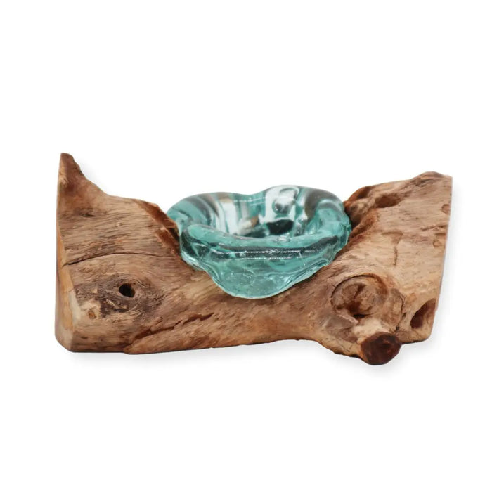 A turquoise glass tealight holder set in rustic natural gamal wood driftwood for a unique glass gamal design