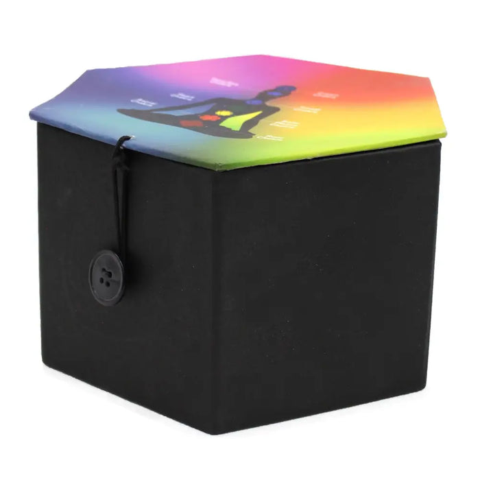 Black hexagonal singing bowl set with rainbow lid showing meditating figure and chakra symbols for moon phase use
