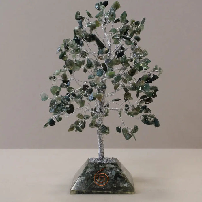 A green moss agate gemstone tree with wire branches and leaf stones on a pyramid organite base with 320 stones
