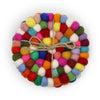 Multi-colour felt ball coasters round set of 4 made of woolen balls in pink blue green and yellow tied with twine