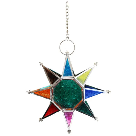 A multi-coloured star tealight lantern with stained glass and a silver chain for hanging as an ornament